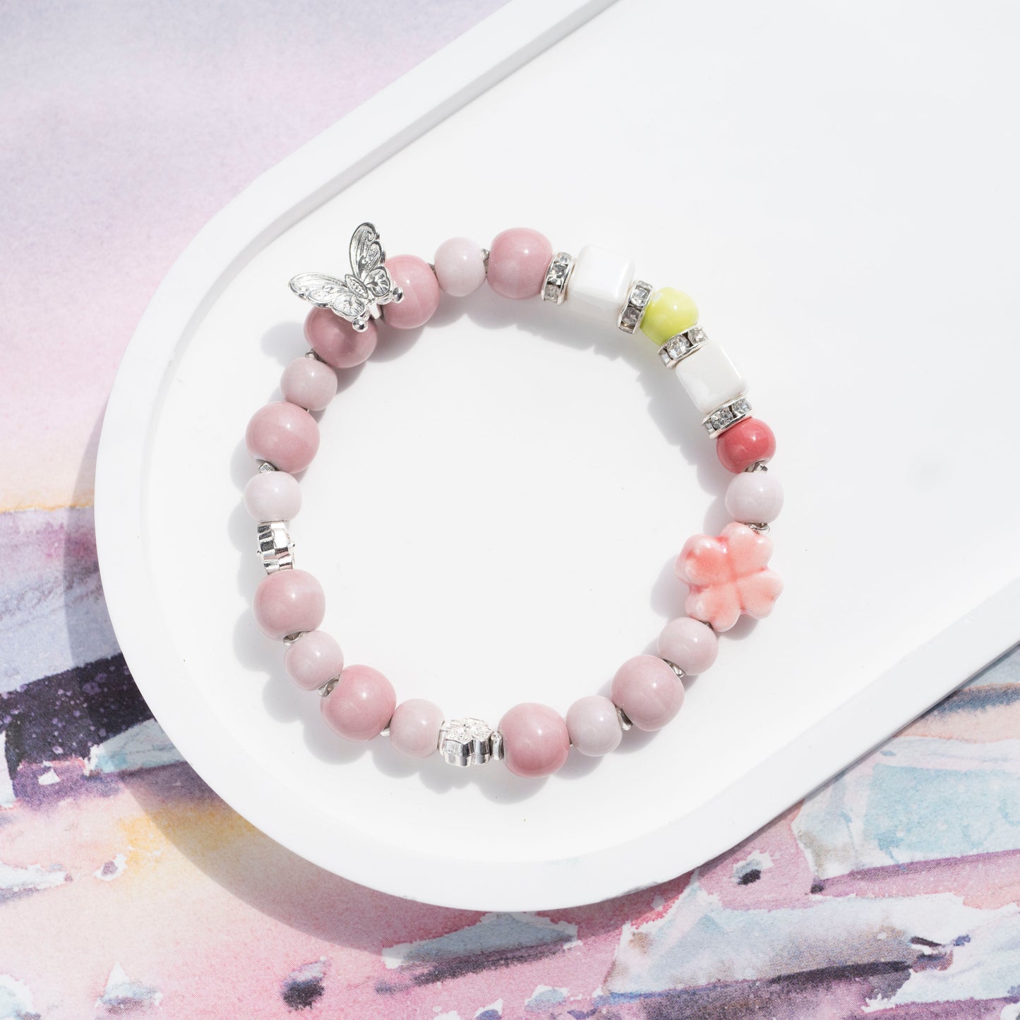 Blush Pink Bracelet with Clover and Butterfly Charm