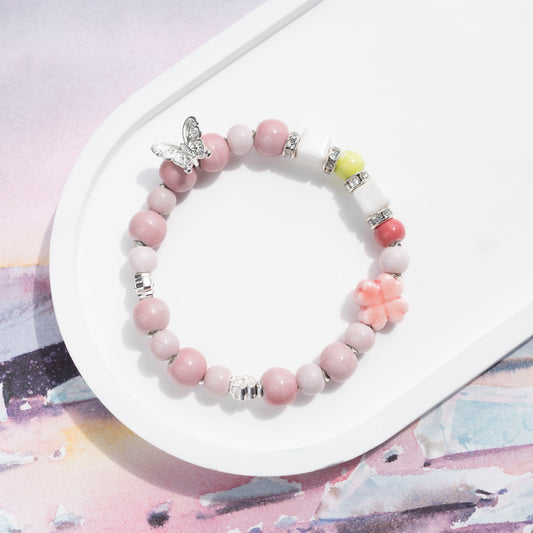Blush Pink Bracelet with Clover and Butterfly Charm